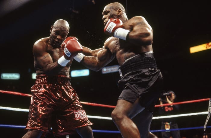Etienne was still climbing when he met a freshly tattooed Tyson in February 2003.